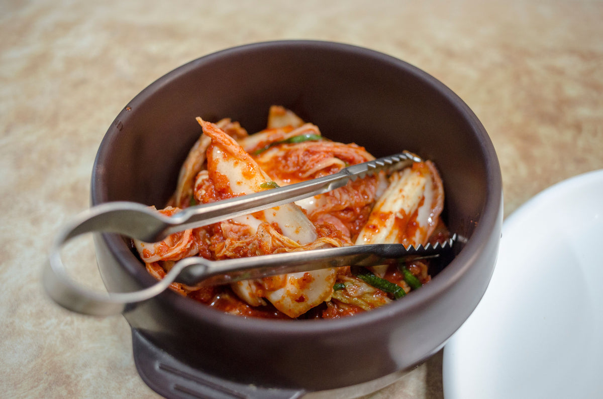 A bowl of kimchi, a gut-friendly fermented food