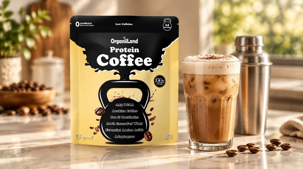 OrganiiLand Protein Coffee bag beside a tall glass of frothy iced protein coffee with a shaker