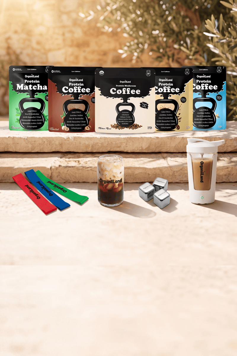 OrganiiLand high protein coffee, protein mushroom coffee and protein matcha with shaker on a sunlit stone ledge