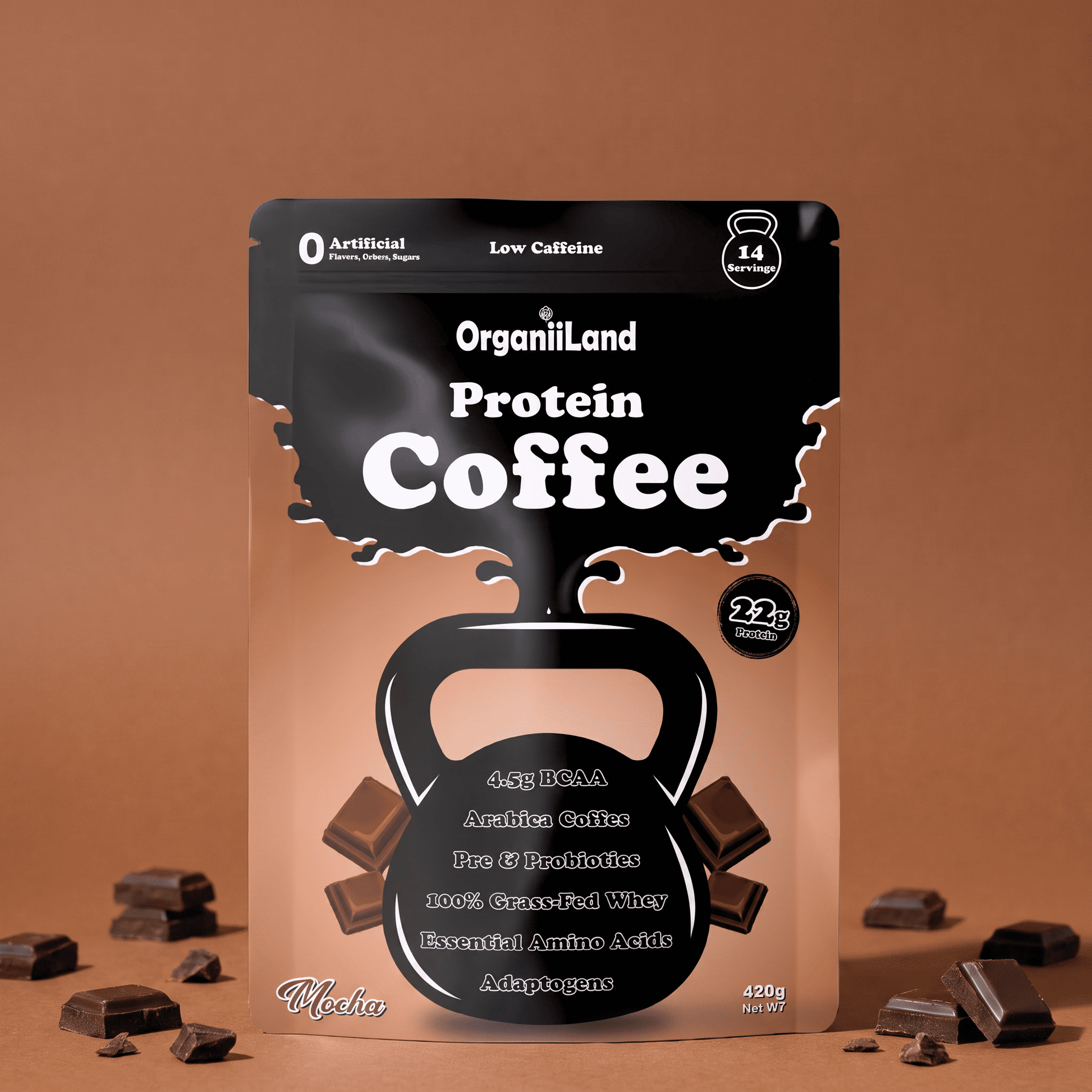 A stand-up pouch of OrganiiLand Protein Coffee in 'Chocolate' flavor, styled on a warm brown background with scattered chocolate pieces. The packaging is black with white text and a kettlebell graphic.