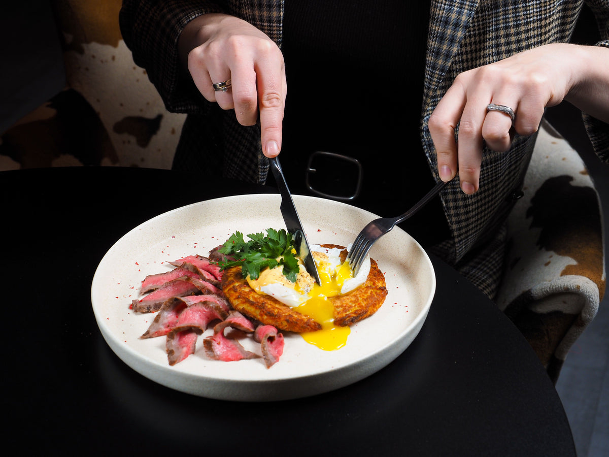 A plate of steak and egg, a source of complete protein